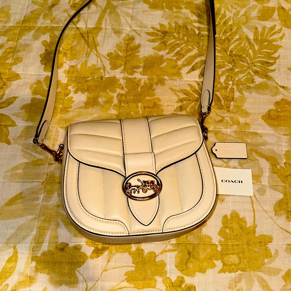 COACH crossbody bag, like new, EUC. Pleased see one flaw in bottom of purse.